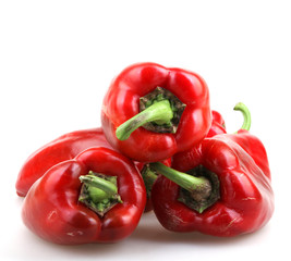 Red chilli peppers on white background