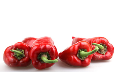 Red chilli peppers on white background