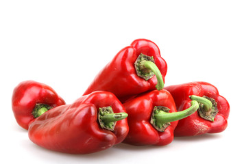Red chilli peppers on white background