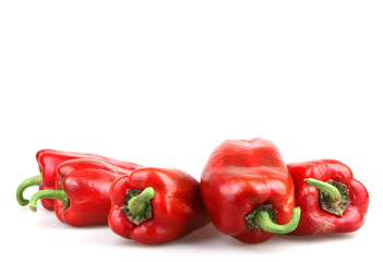 Red chilli peppers on white background