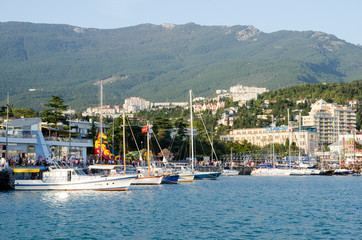 Fototapeta na wymiar View of the port and the promenade of Yalta. Crimea.