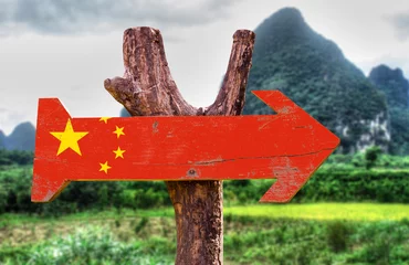 Foto op Canvas China flag wooden sign with rural background © gustavofrazao