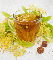 Cup of herbal tea with linden flowers