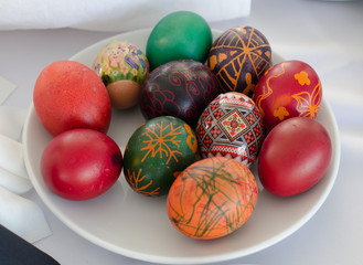 Fototapeta na wymiar Painted Easter eggs on the plate