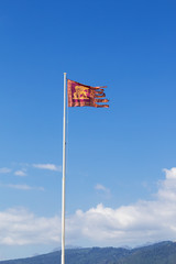 flag of the republic of venice waves in the wind on a tall pole