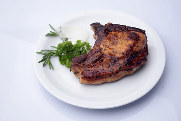  Fried ribeye steak with herbs