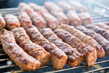 Tasty meat on a barbeque. 