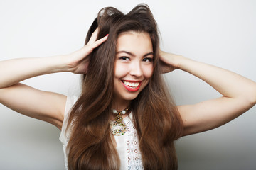 Fototapeta premium Beautiful young surprised woman. 