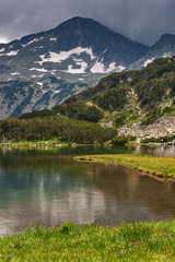 Amazing view of Muratovo Lake and reflection of Banski Suhodol Peak, Pirin Mountain, Bulgaria