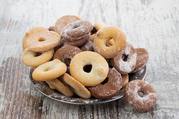 Fresh cookies over wooden vintage background