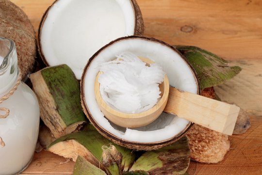 white coconut and milk on wood background