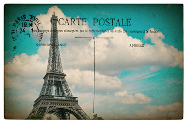 French postcard from Paris with landmark Eiffel Tower blue sky