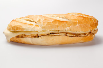 Sandwich with chicken and cheese on a white background.