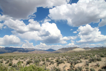 blue sky with clouds in the desert
