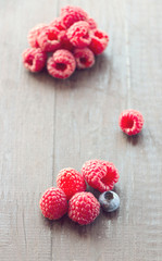 Fresh raspberries on a wooden table