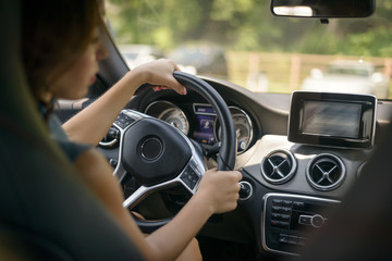 Female driving car. Selective focus.