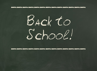 "Back to School!". Inscription on blackboard.
