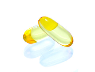 yellow vitamin omega3 fish oil capsule  on white background.