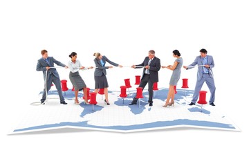 Composite image of business team pulling the rope 