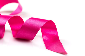 Pink breast cancer ribbon isolated on white background