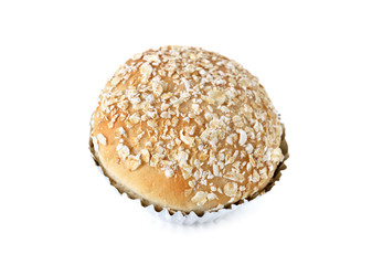 Banana whole wheat bun on white background