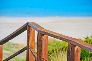 wooden fence in La Pelosa beach