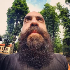  super bearded bald man serious taking selfie from the bottom © Eugenio Marongiu