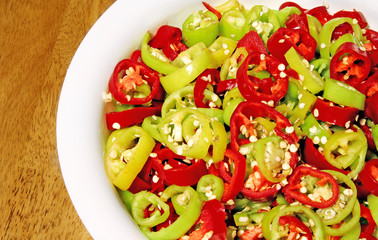 Red and Green Hot Chili Peppers – A bowl of sliced red and green hot chili peppers.