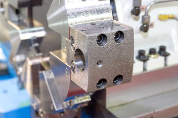 Rotating head in a high precision mechanics plant at CNC lathe