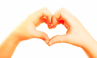 Obraz premium Heart shaped by child hands isolated on white