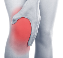 Young woman with knee pain isolated on white