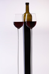 Stretched wine bottle and glasses