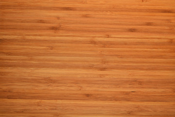 Naklejka premium Bamboo wooden cutting kitchen board background