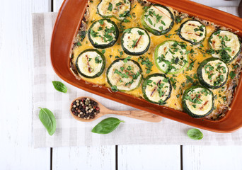Casserole with vegetable mallow on wooden table, top view