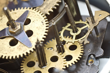Cogwheels Inside Old Clockwork. Macro
