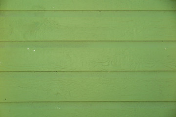 Wood plank green texture background.