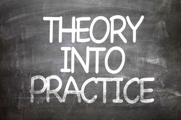 Obraz premium Theory into Practice written on a chalkboard