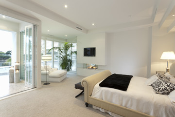 Warm bedroom with a terrace