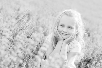 portrait smiling toddler girl in lavender