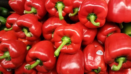 Red Bell Peppers at a Produce Stand