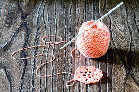 Cotton yarn and hook. Needlework accessories.