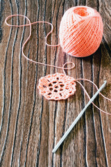 Cotton yarn and hook. Needlework accessories.
