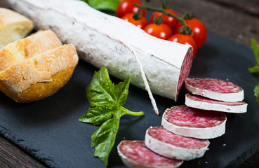 Salami bread with basil and cherry tomatoes