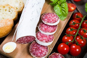 Salami bread with basil and cherry tomatoes
