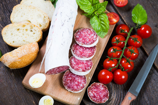 Salami bread with basil and cherry tomatoes