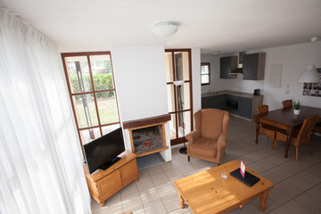 Modern, bright, clean, living room   in a  house