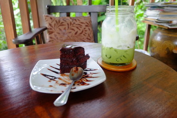 A piece of cake and green tea
