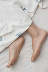 Feet of sleeping woman