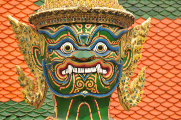 Giant or Yaksha, guarding an exit to Grand Palace at Wat Phra Kaew Temple of the Emerald Buddha, Thailand