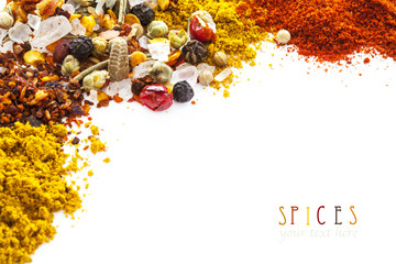 Assorted spices on white background